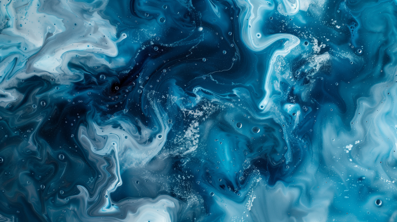 Abstract image featuring swirls of blue and white reminiscent of liquid in motion, with hints of bubbles and a marbled appearance.